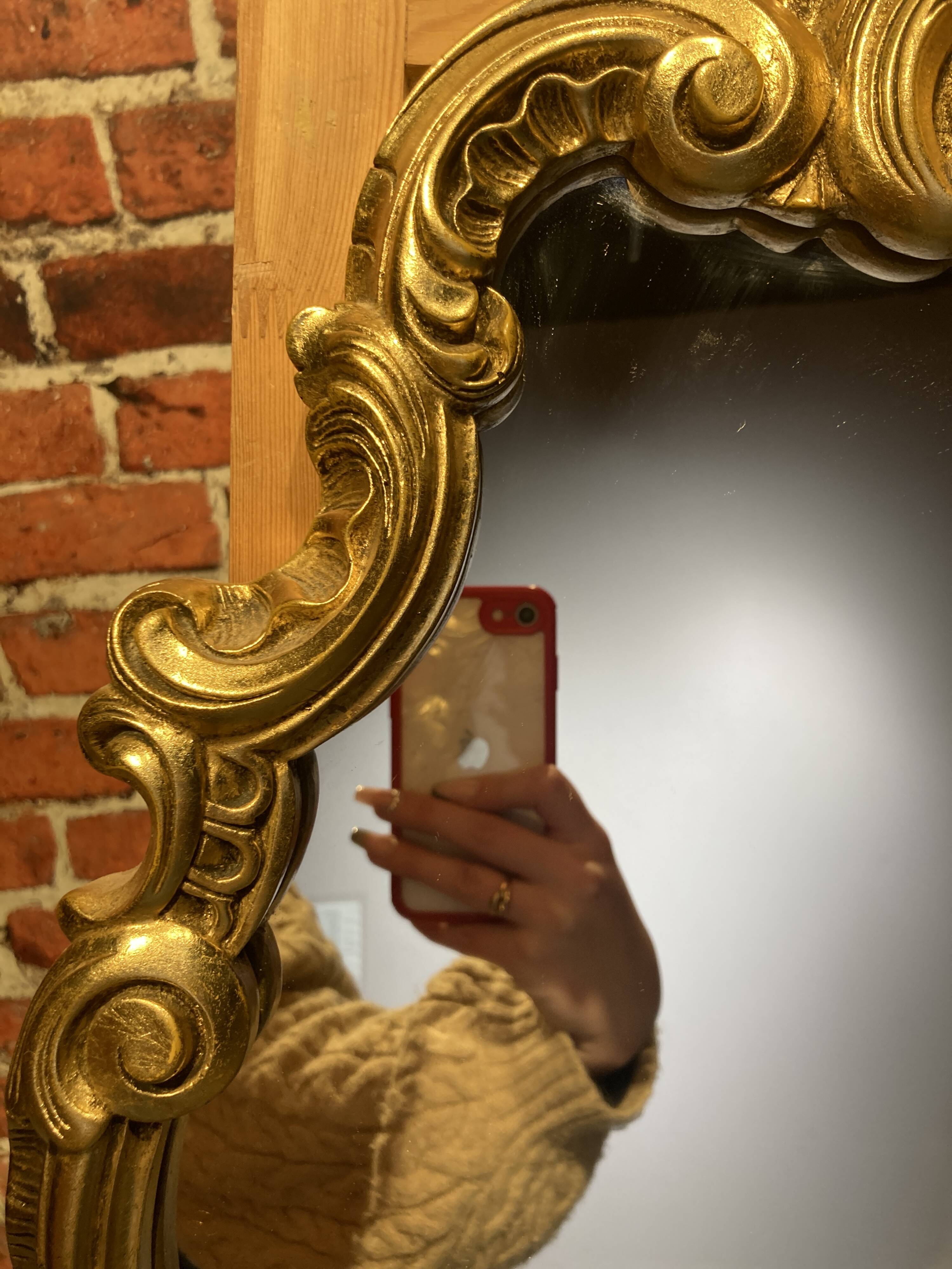 Wooden mirror with moldings