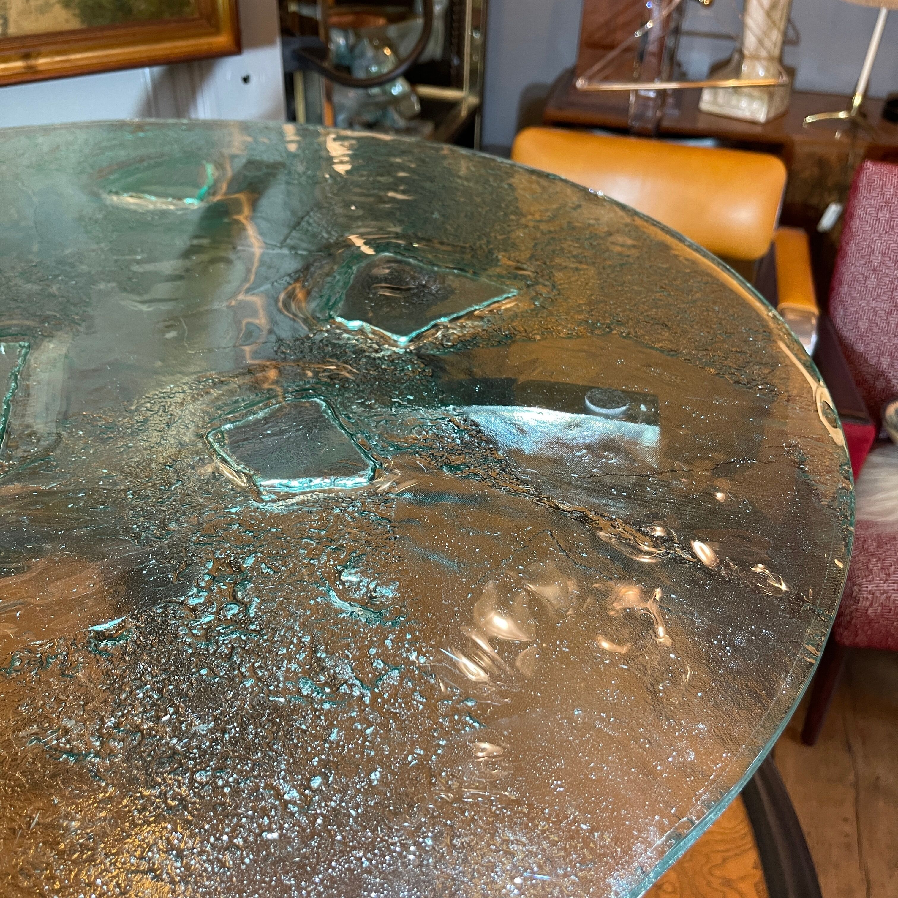 Pair of round coffee tables, glass, ca 1970