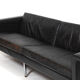 Danish leather sofa with chrome legs and teak ends