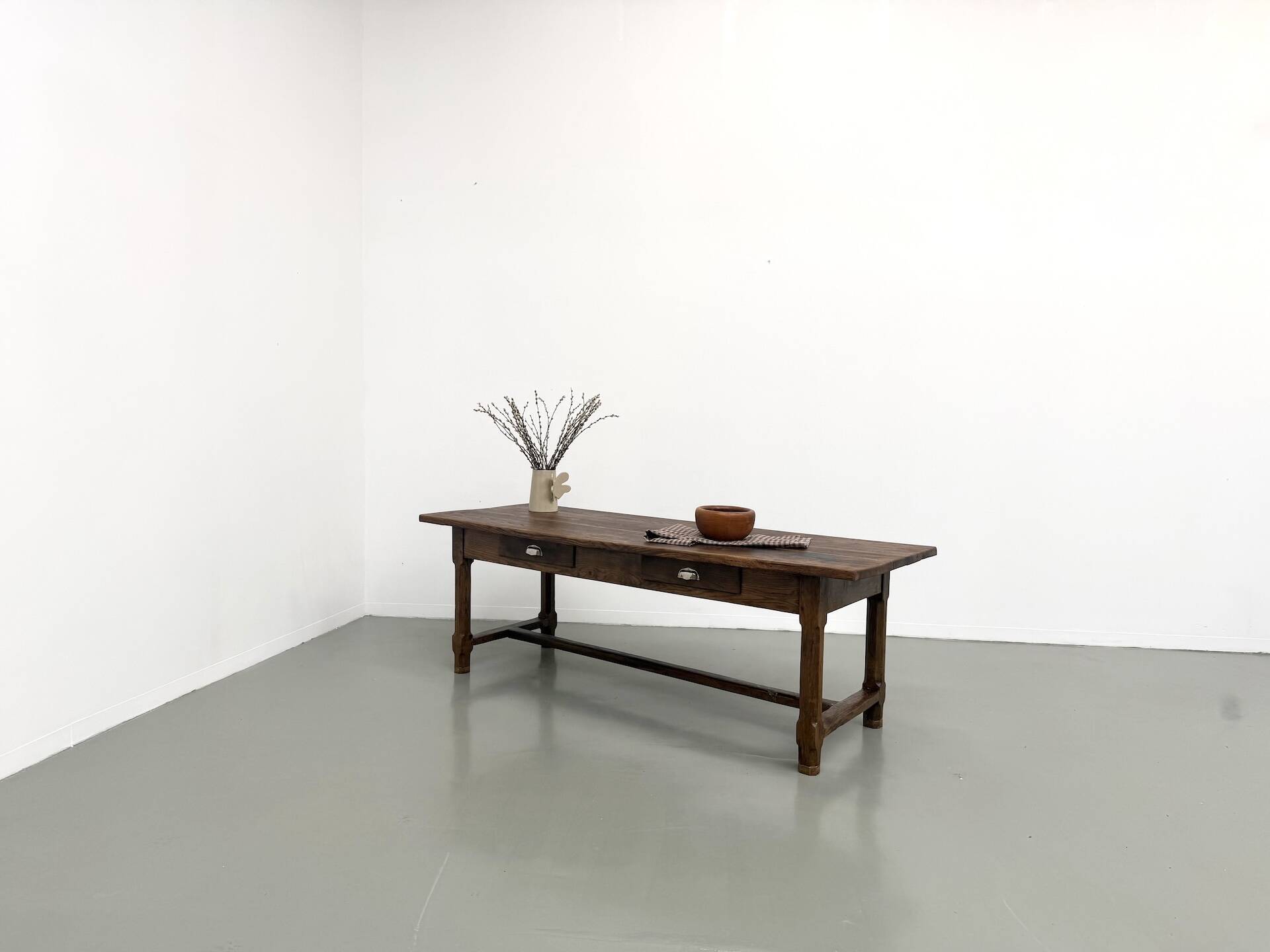 Authentic French farmhouse table from 1890 in solid oak with two drawers.