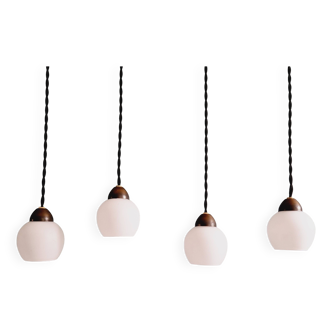 Set of 4 pendant lights in white satin glass and brass, 1950s-60s
