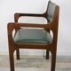 60s armchair in wood and dark green imitation leather