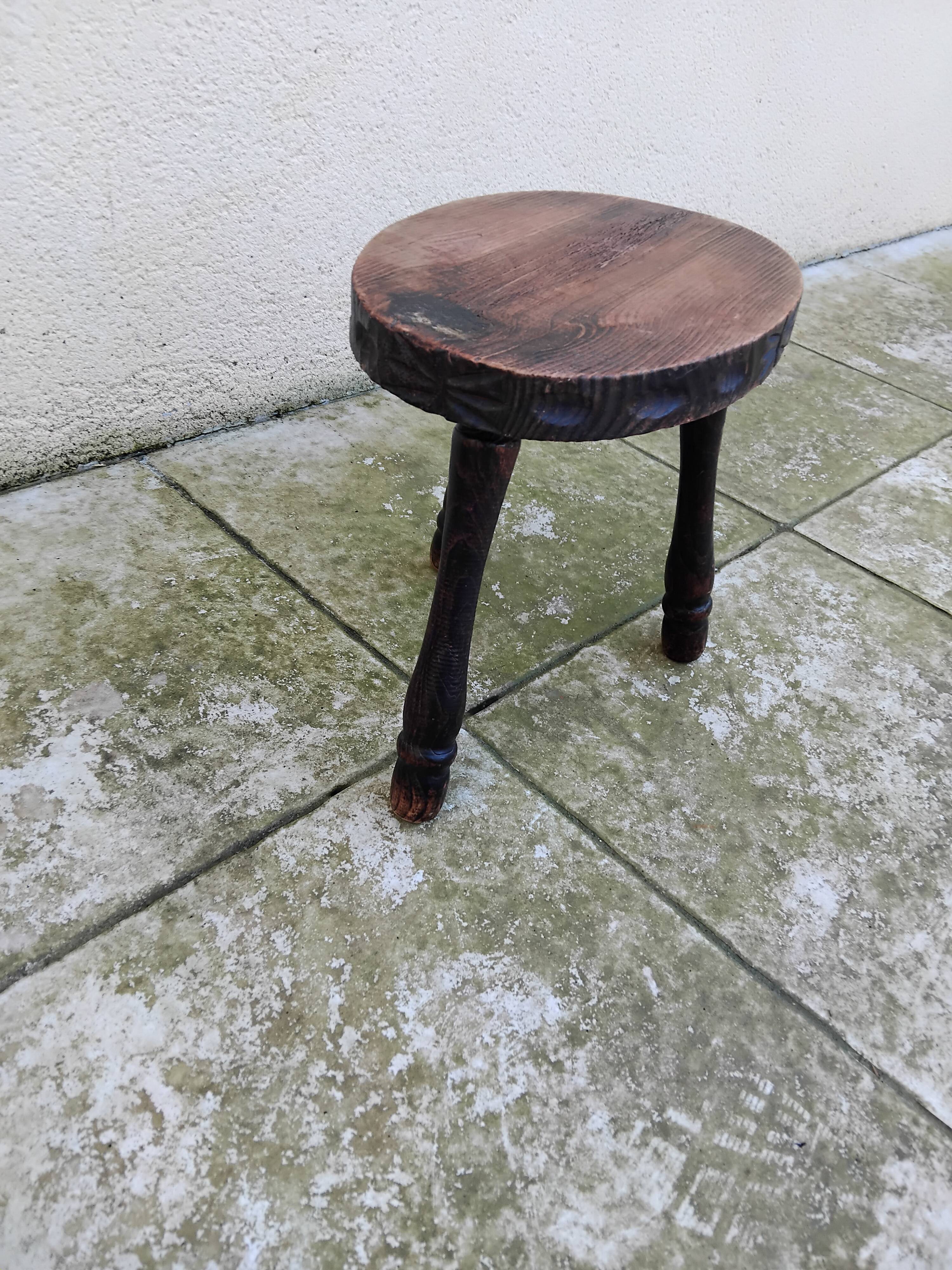 Old vintage oval tripod stool