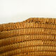 Old large bread basket of baker in braided wicker
