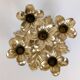 Brass flower candle holder