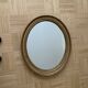 Old oval golden mirror