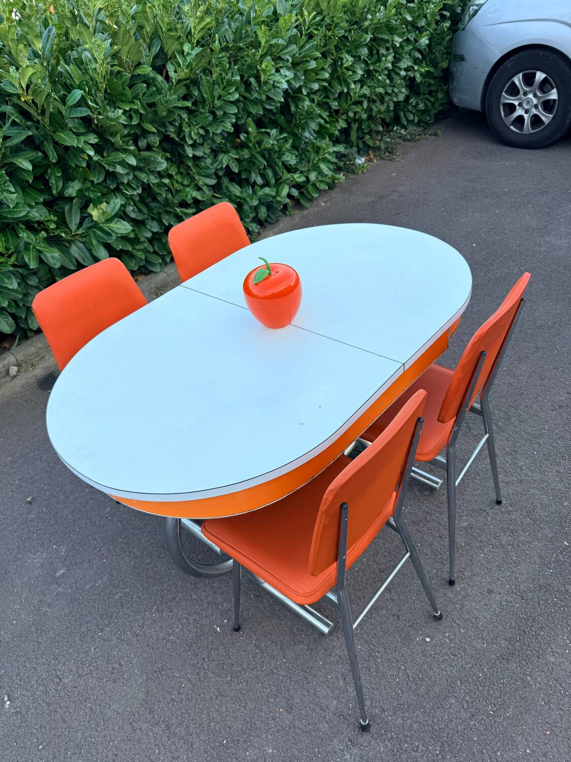 Formica leatherette chair with orange table, vintage 70s Space Age