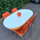 Formica leatherette chair with orange table, vintage 70s Space Age