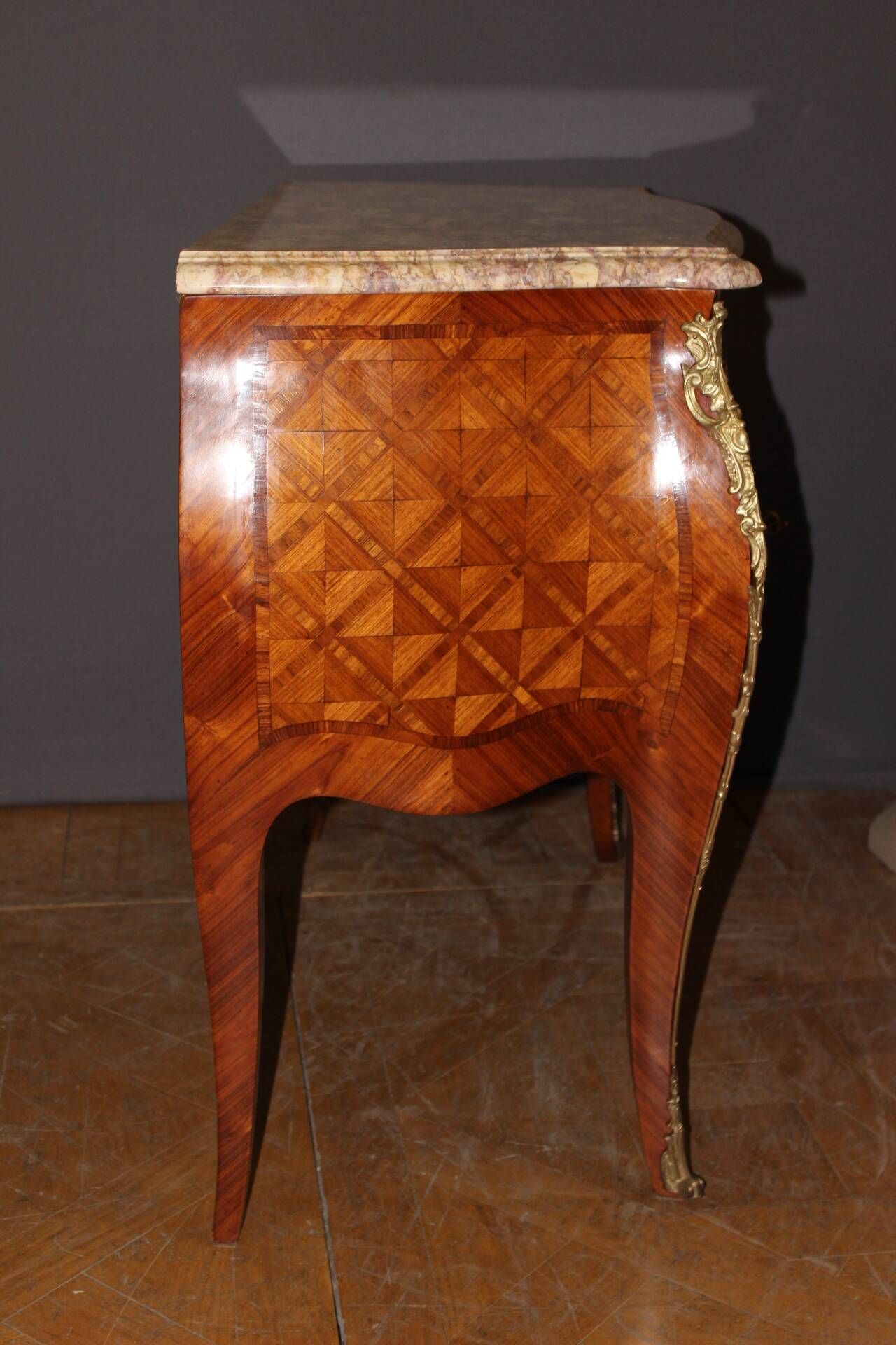 Louis XV commode in marquetry