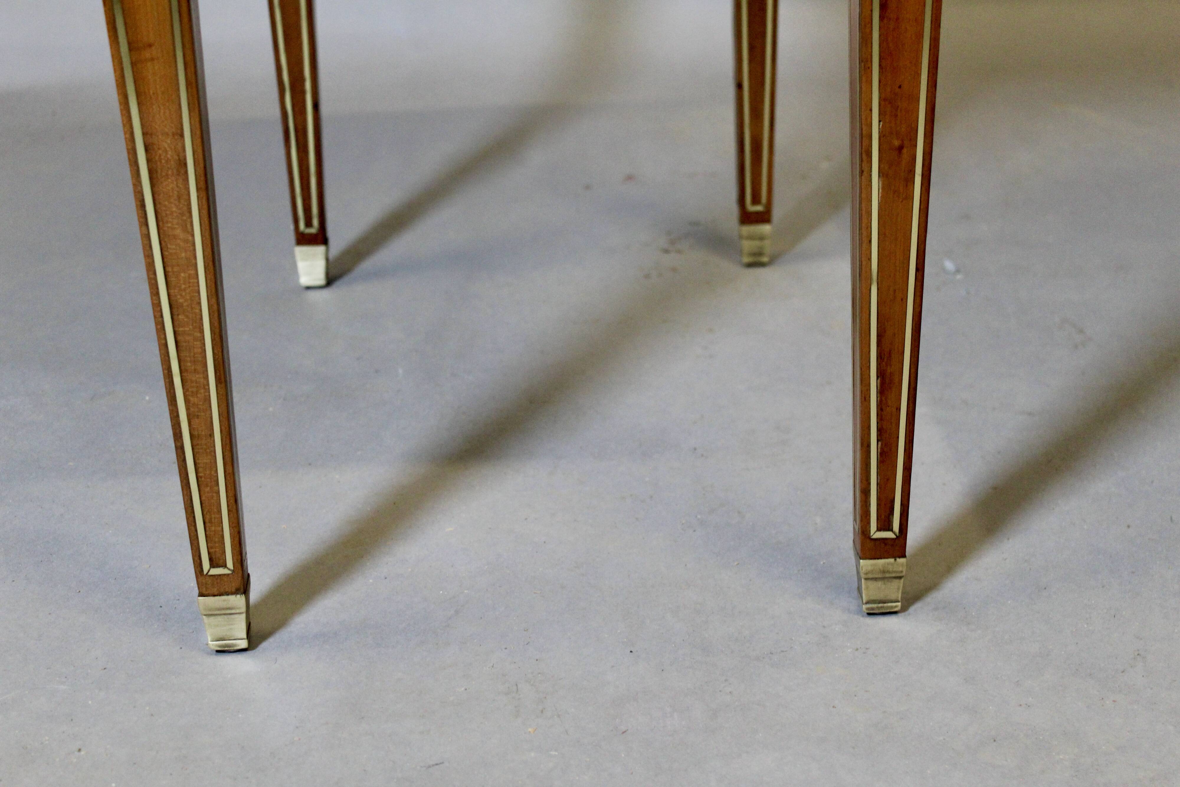 Louis XVI writing table with brass beading