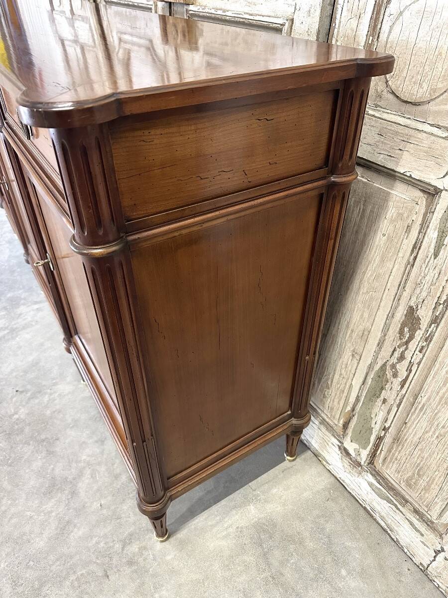 Louis XVI style enfilade in cherry wood, 20th century.