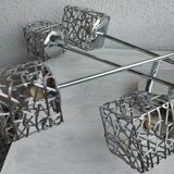 Articulated chromed metal luminaire