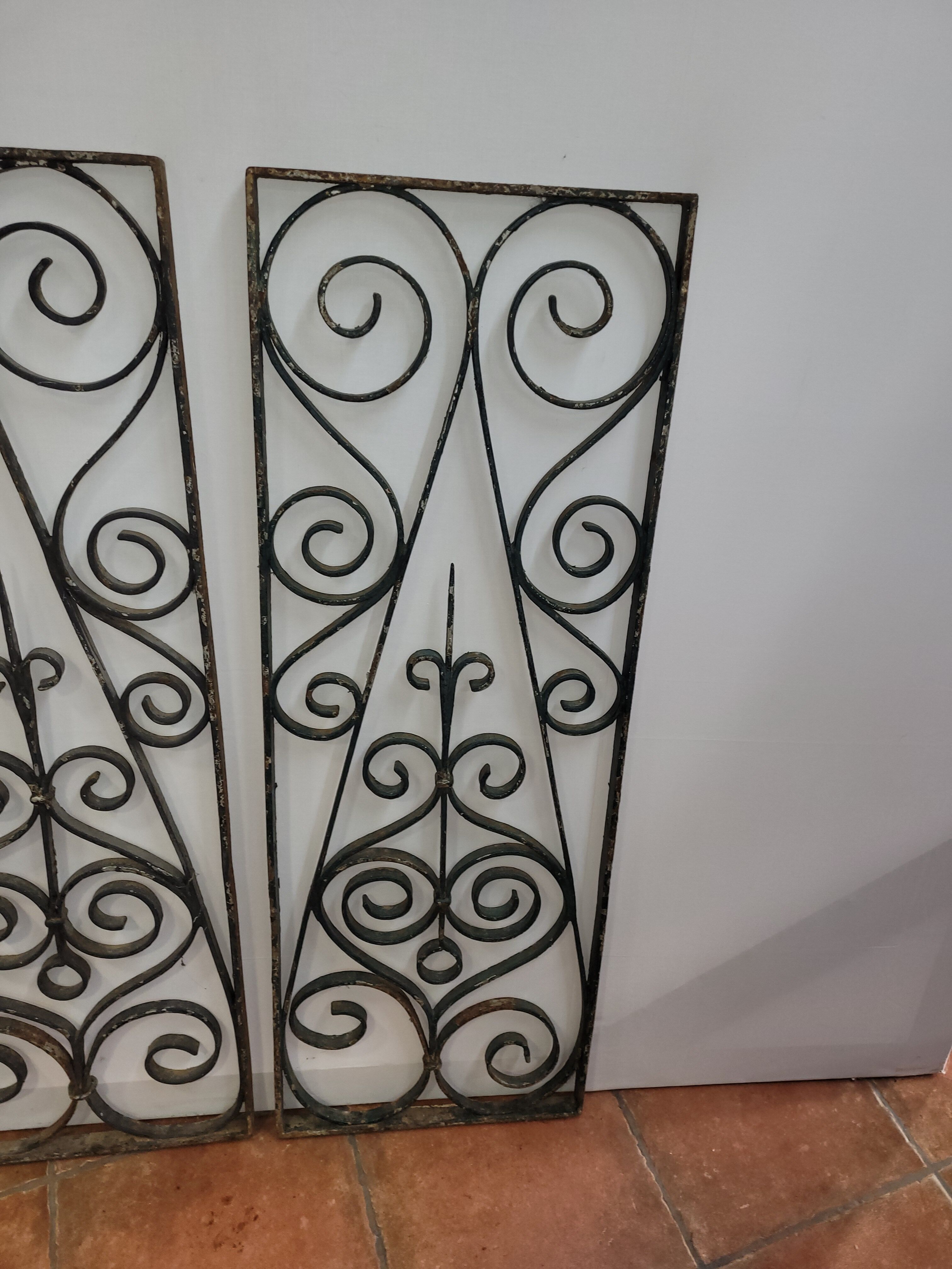 Pair of wrought iron grids