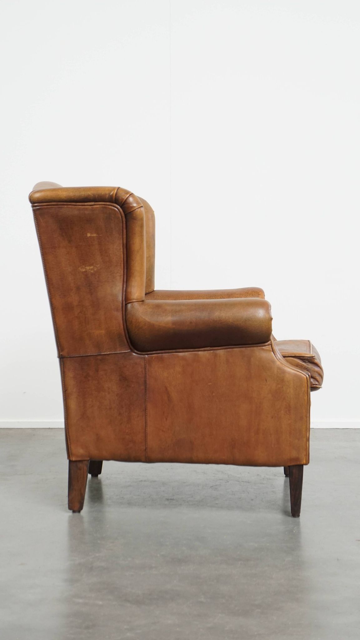 Fauteuil à oreilles vintage en cuir de mouton