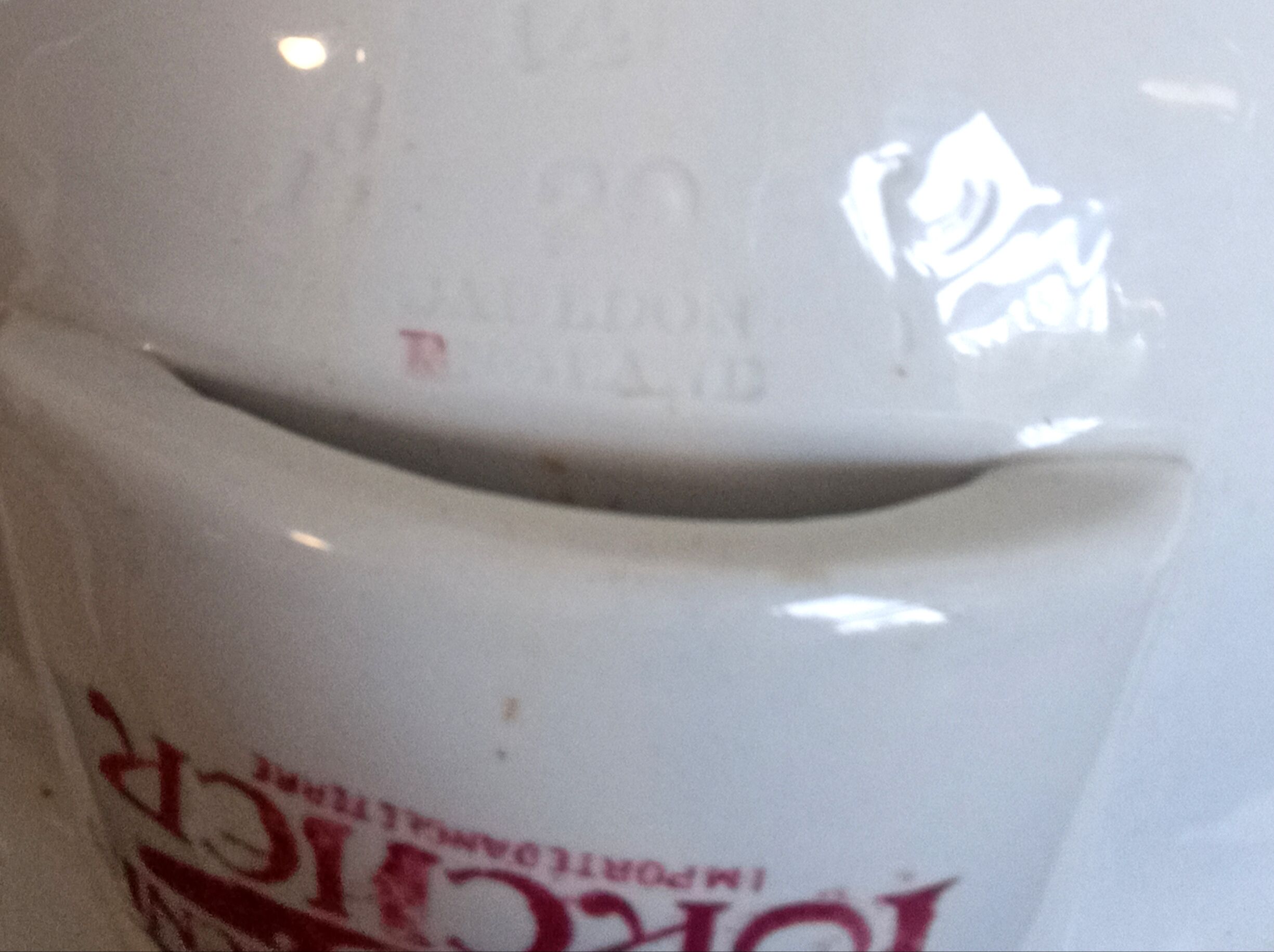 Porcher antique porcelain tilting basin