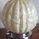 Authentic 20th-century Art Deco globe lamp in coloured glass.