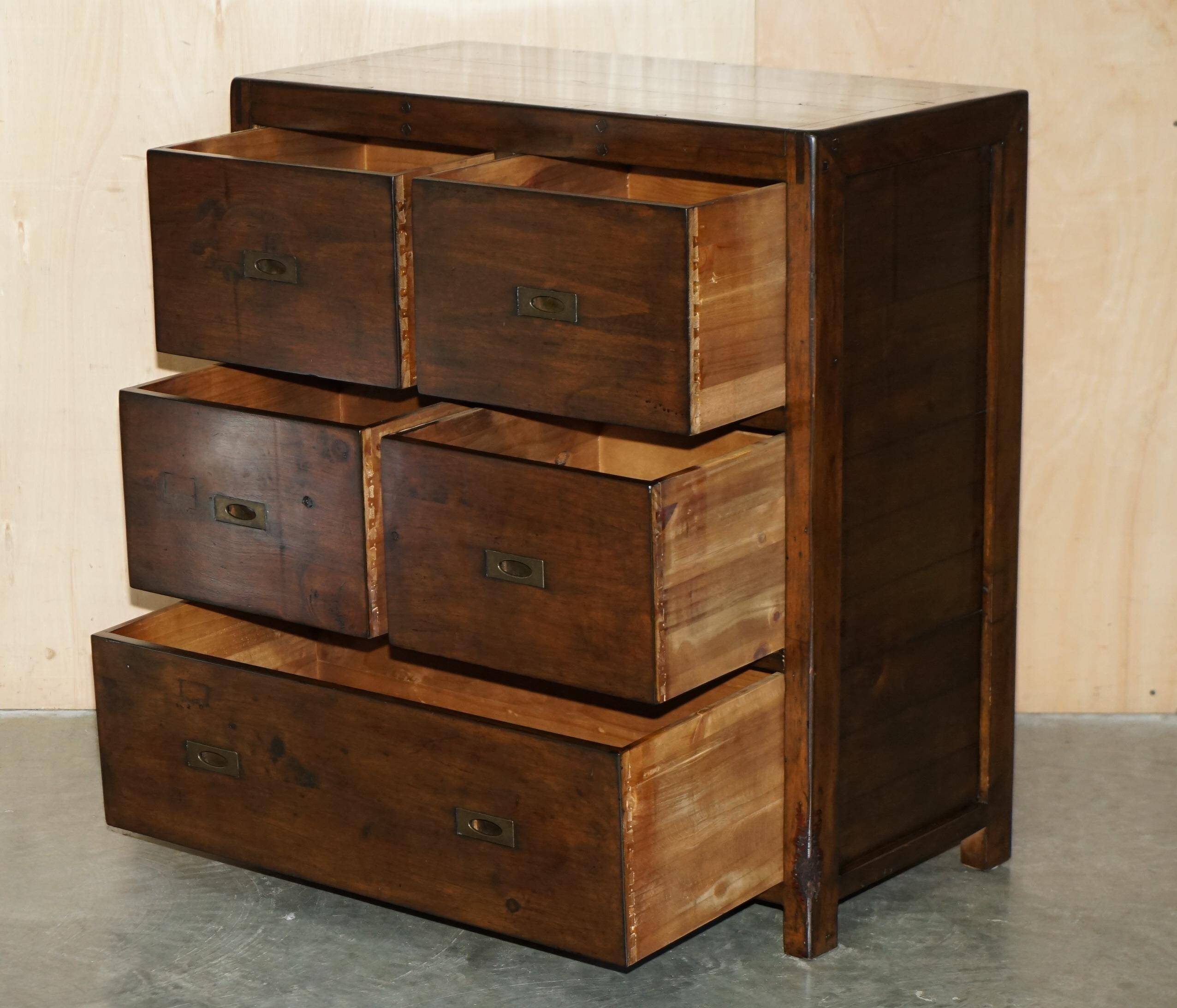 Large vintage hardwood furniture in military country style.