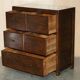 Large vintage hardwood furniture in military country style.