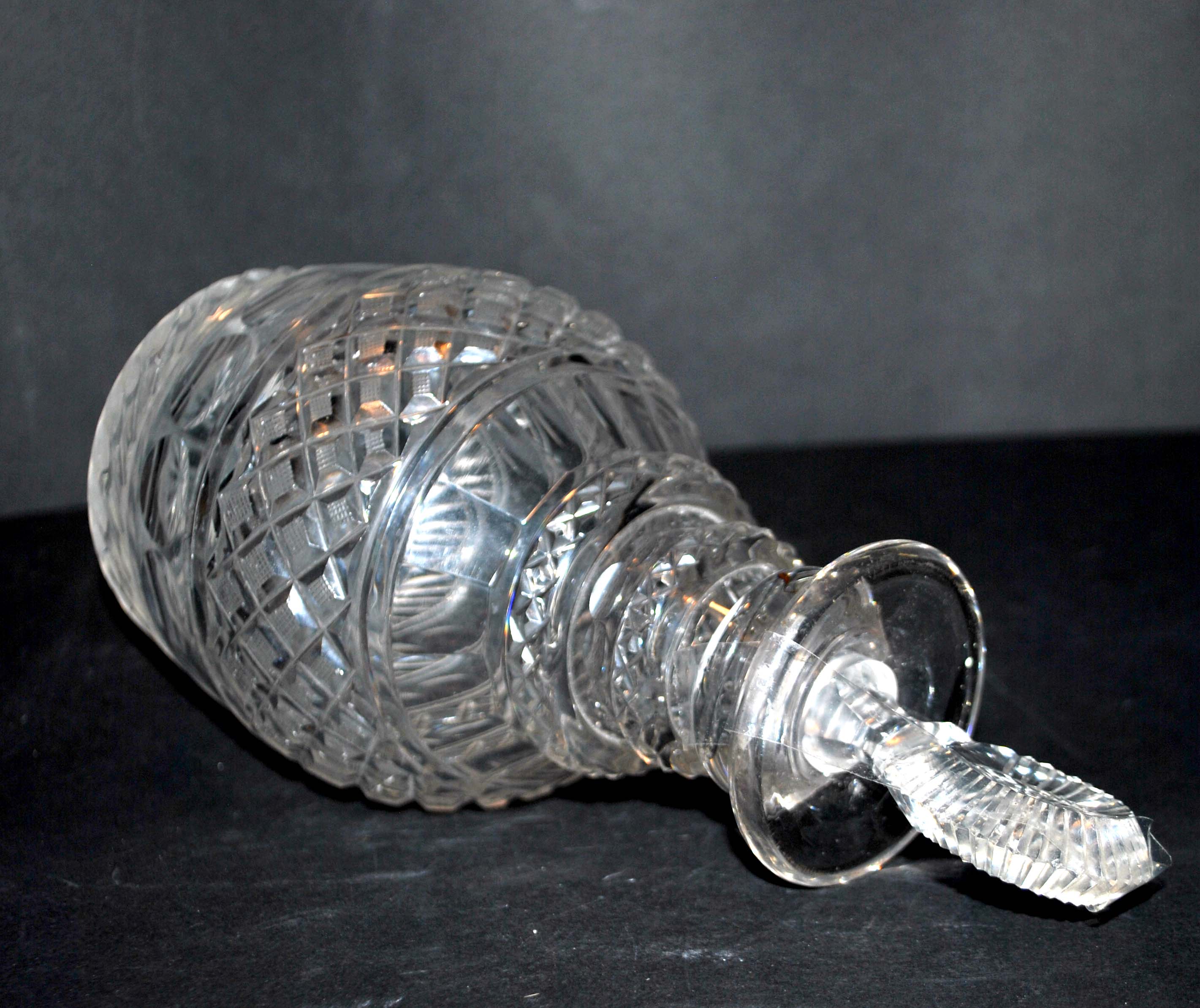 Richly cut crystal decanter and bevelled diamond engraved baccarat or saint-louis? trianon