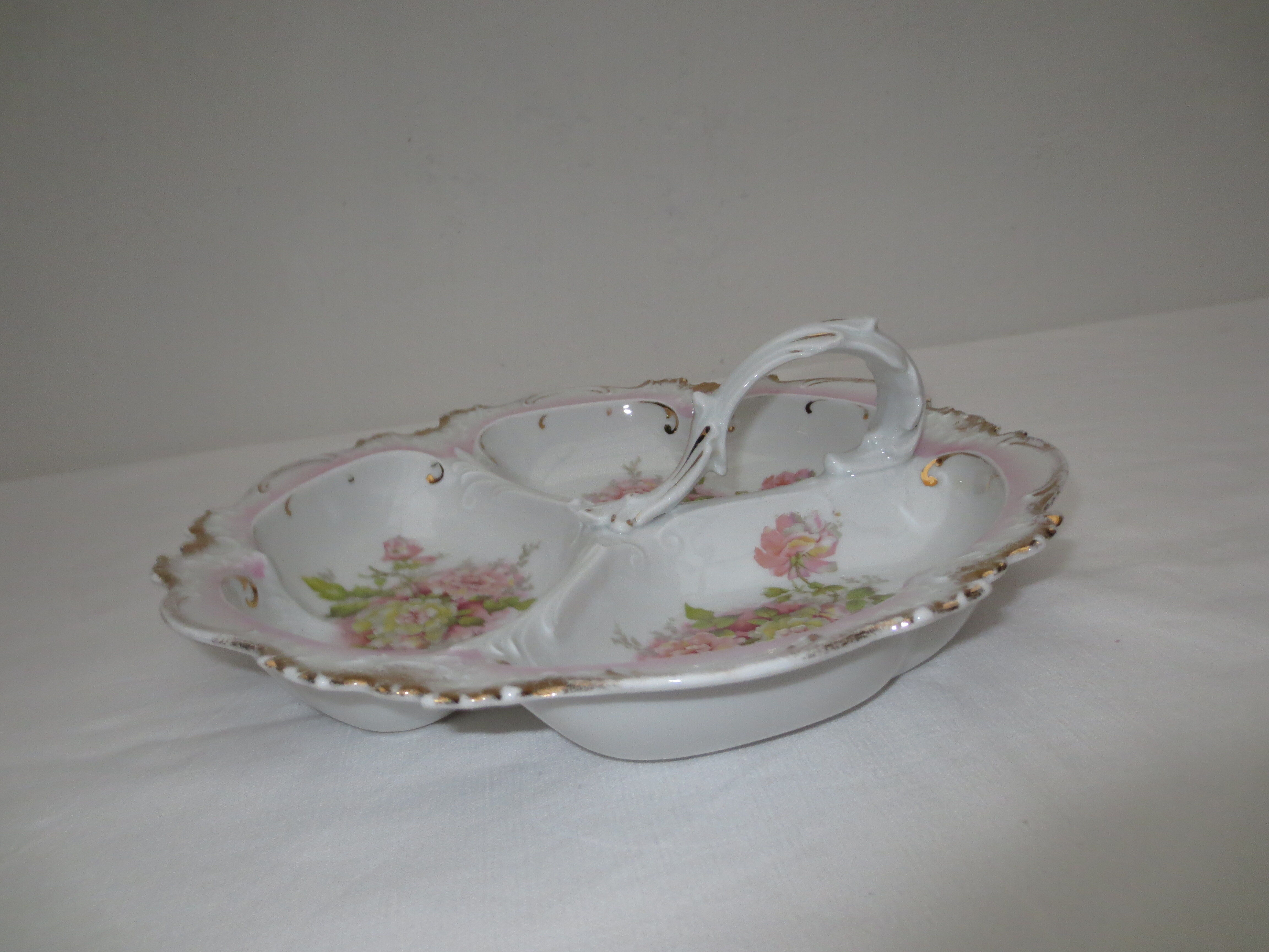 Numbered decorated porcelain quarter dish for hors d'oeuvre or other