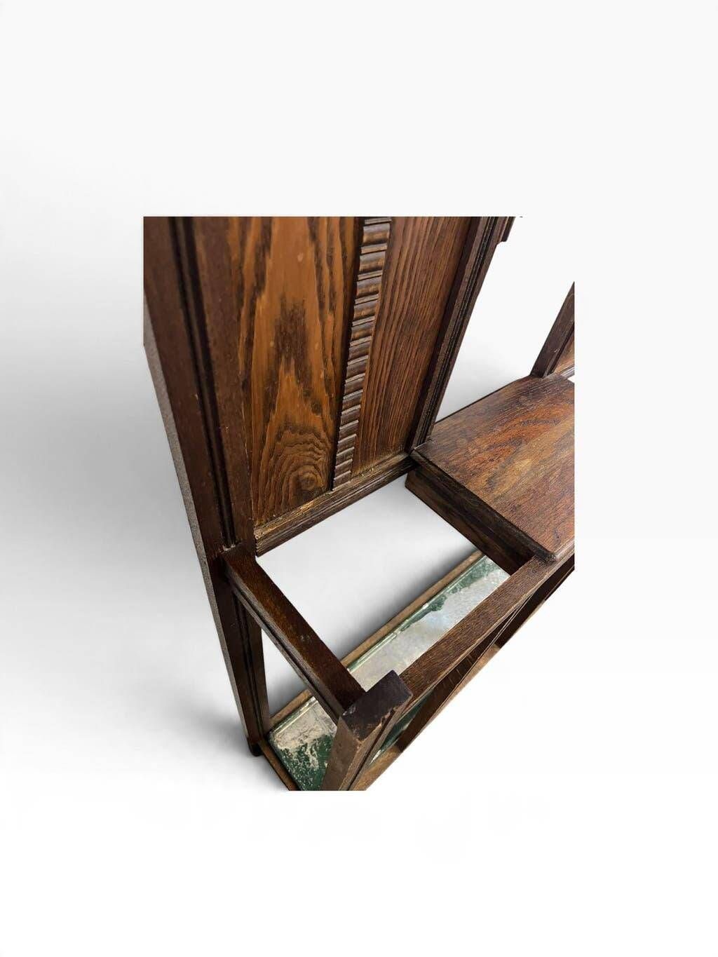 Vintage wooden coat rack with mirror.
