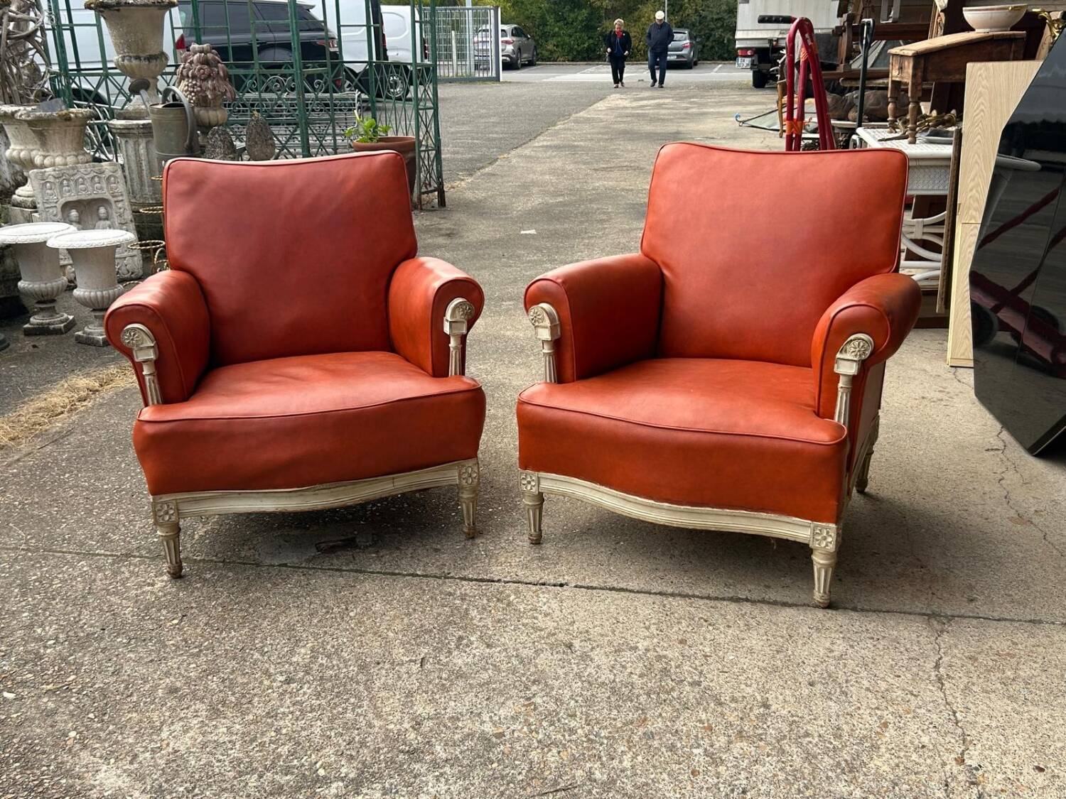 Pair of neoclassical bergère armchairs by Maison Jansen circa 1950.