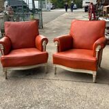 Pair of neoclassical bergère armchairs by Maison Jansen circa 1950.