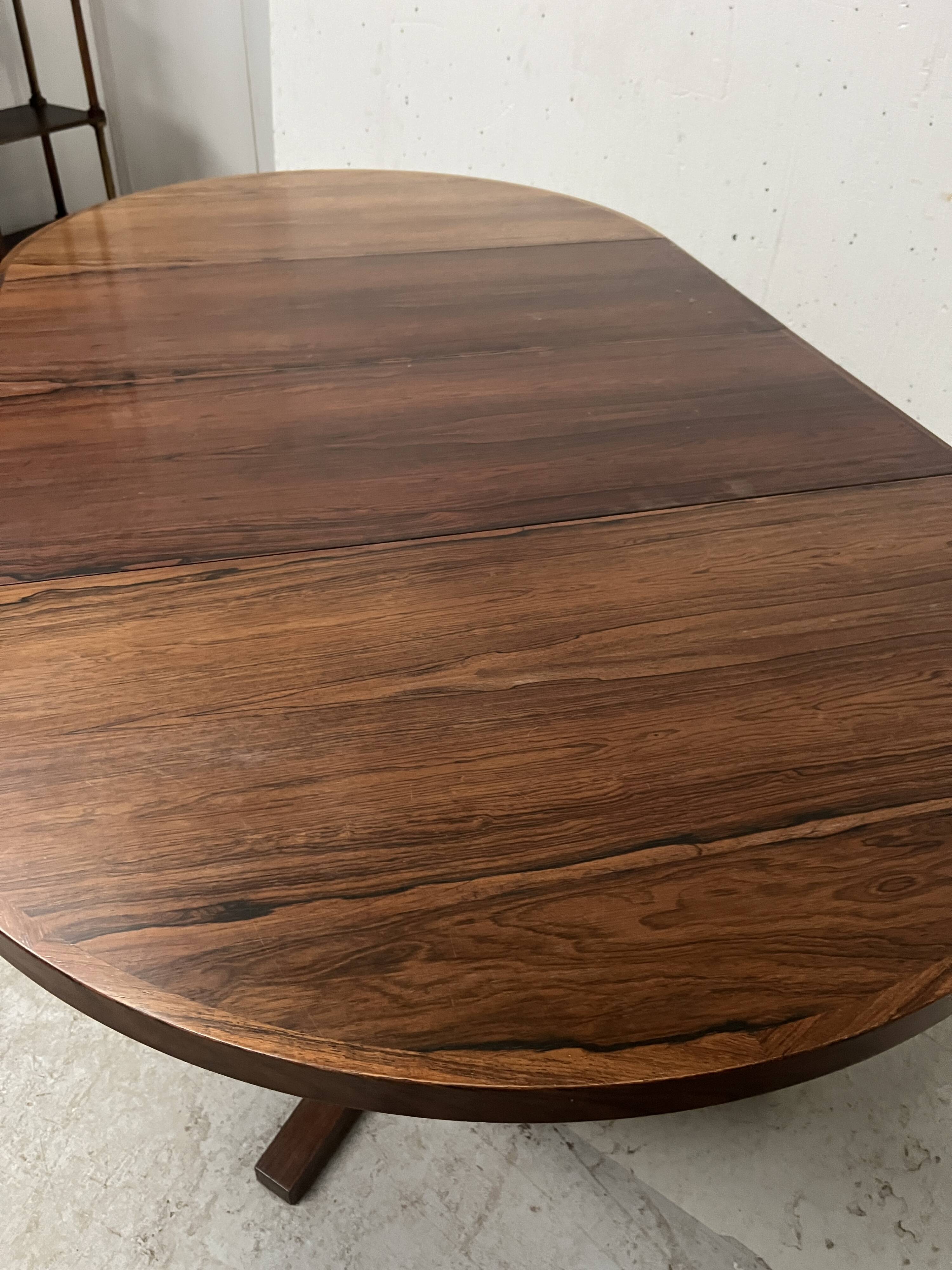 Scandinavian dining table in rosewood veneer "by John MORTENSEN"
