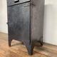 Old Industrial workshop furniture with 1 door 1 drawer in patinated iron