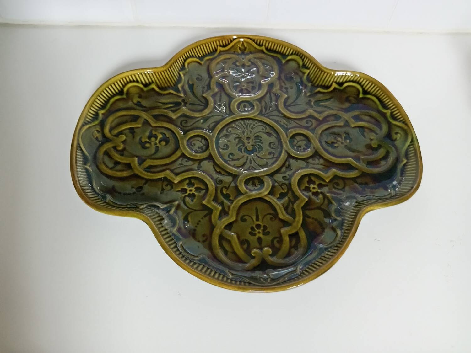 Olive green earthenware dish
