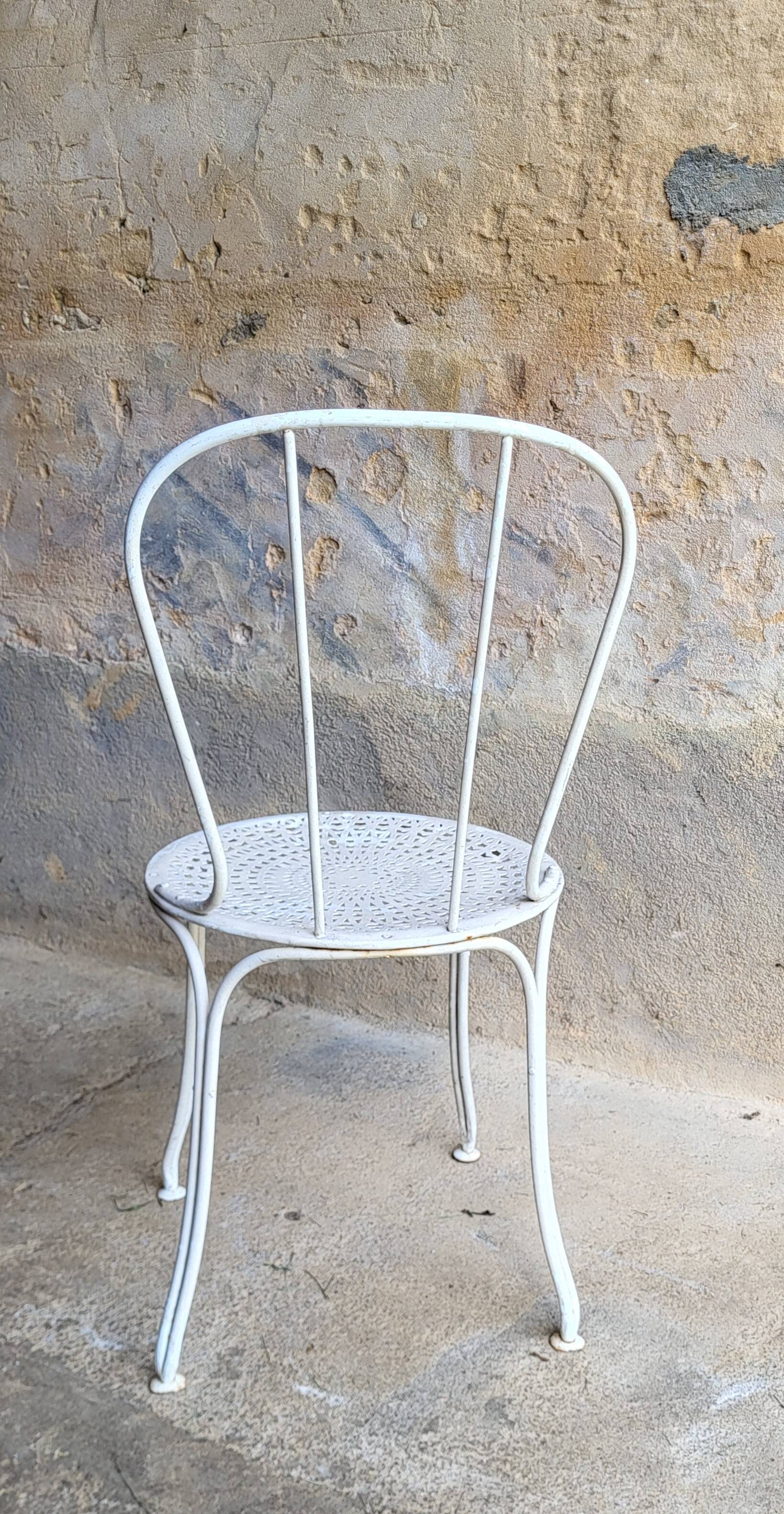 Pair of iron garden chairs