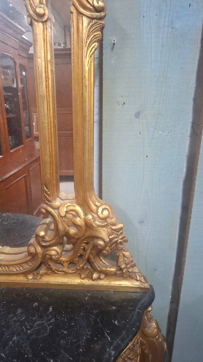 Mirror and console set in Louis XV style.