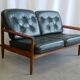 Scandinavian sofa in teak and green leather