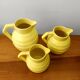 3 Orchies art deco pitchers in yellow ceramic