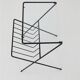 Filigree mid-century modern side table with magazine rack / steel / glass / 1960s