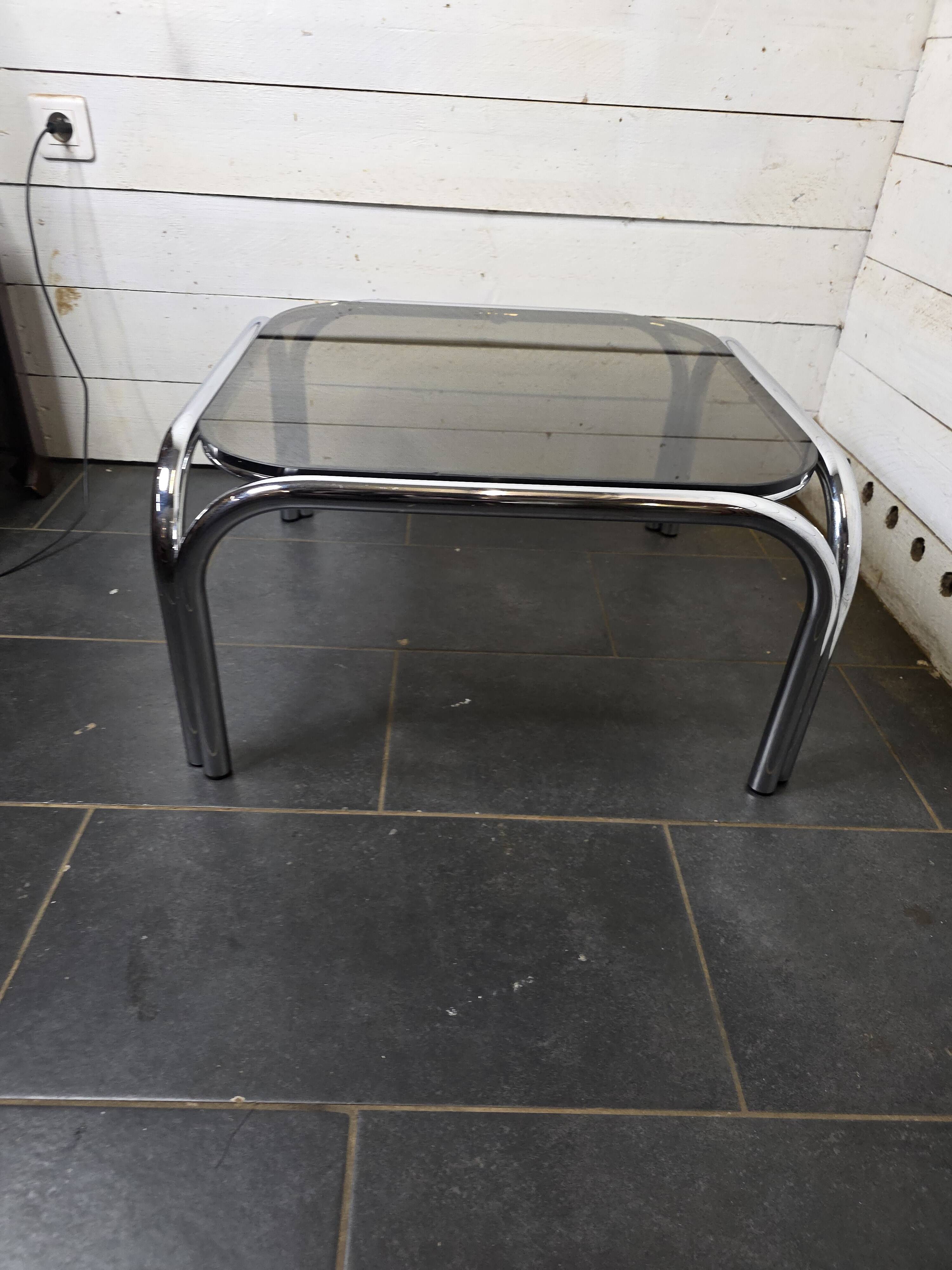 Chrome metal coffee table with smoked glass top from the 70s