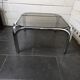 Chrome metal coffee table with smoked glass top from the 70s