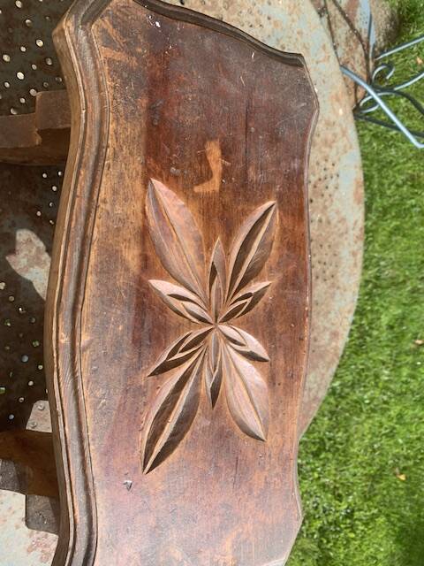 Bench in carved and varnished wood, mountain chalet decoration, old