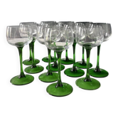 Set of 12 Alsatian Roemer glasses with green stems.