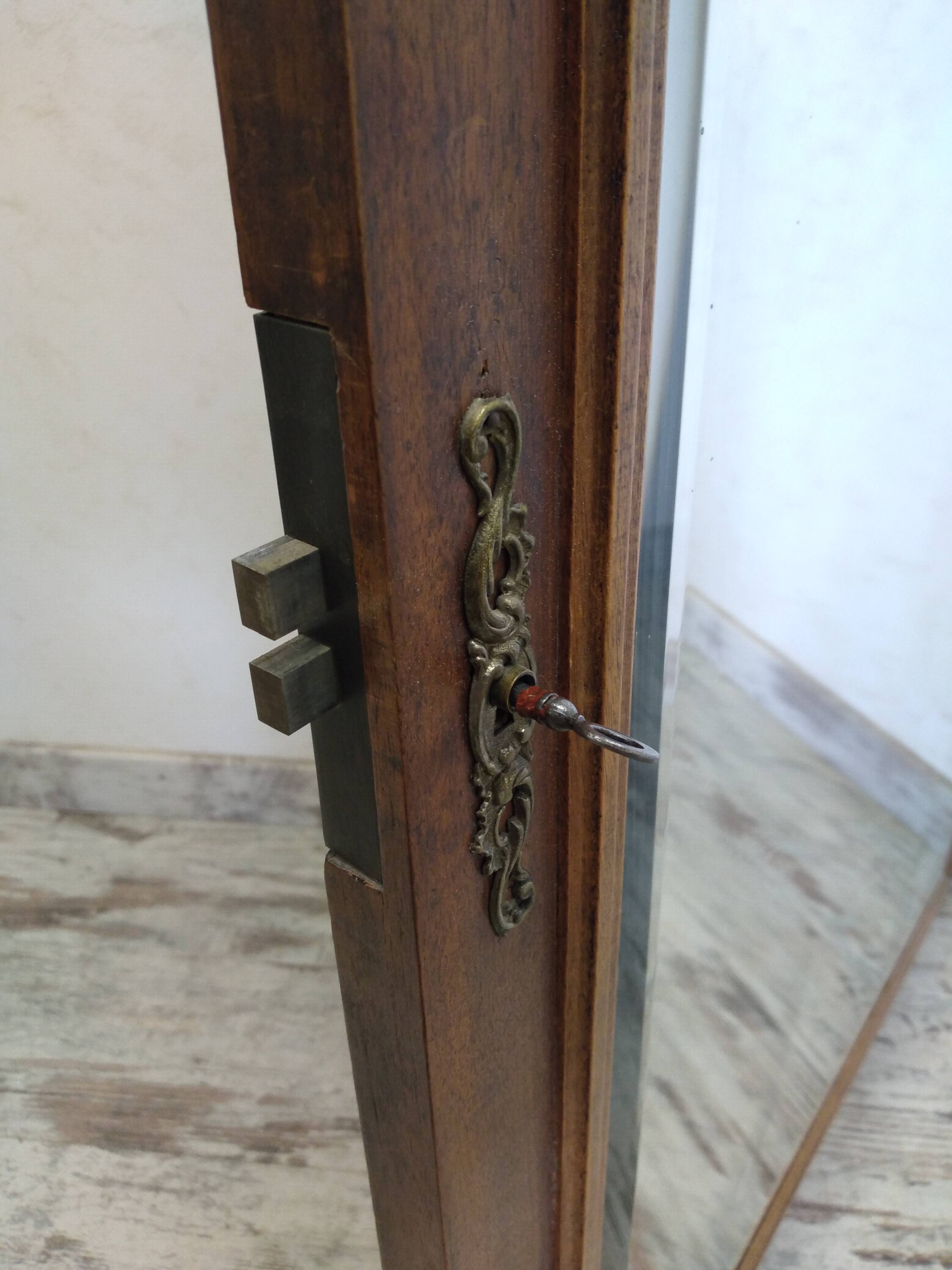 Old hosiery door with mirror