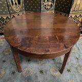 Round walnut farmhouse table with belt