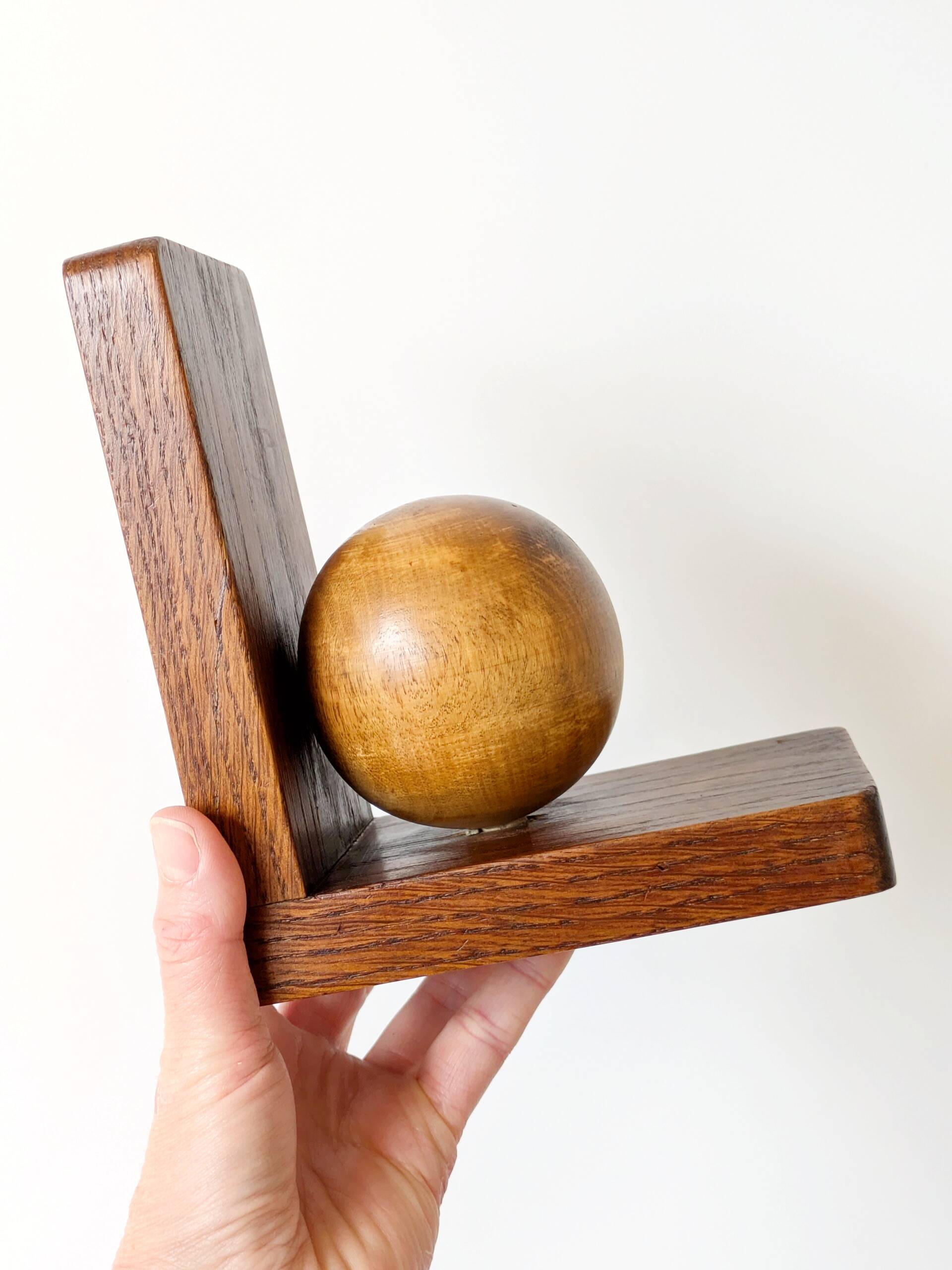 Pair of antique oak ball bookends, Midcentury Art Deco