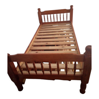 Brown wooden bed