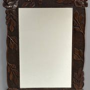 Arts & Crafts hand-carved wall mirror with floral roses, early 20th century