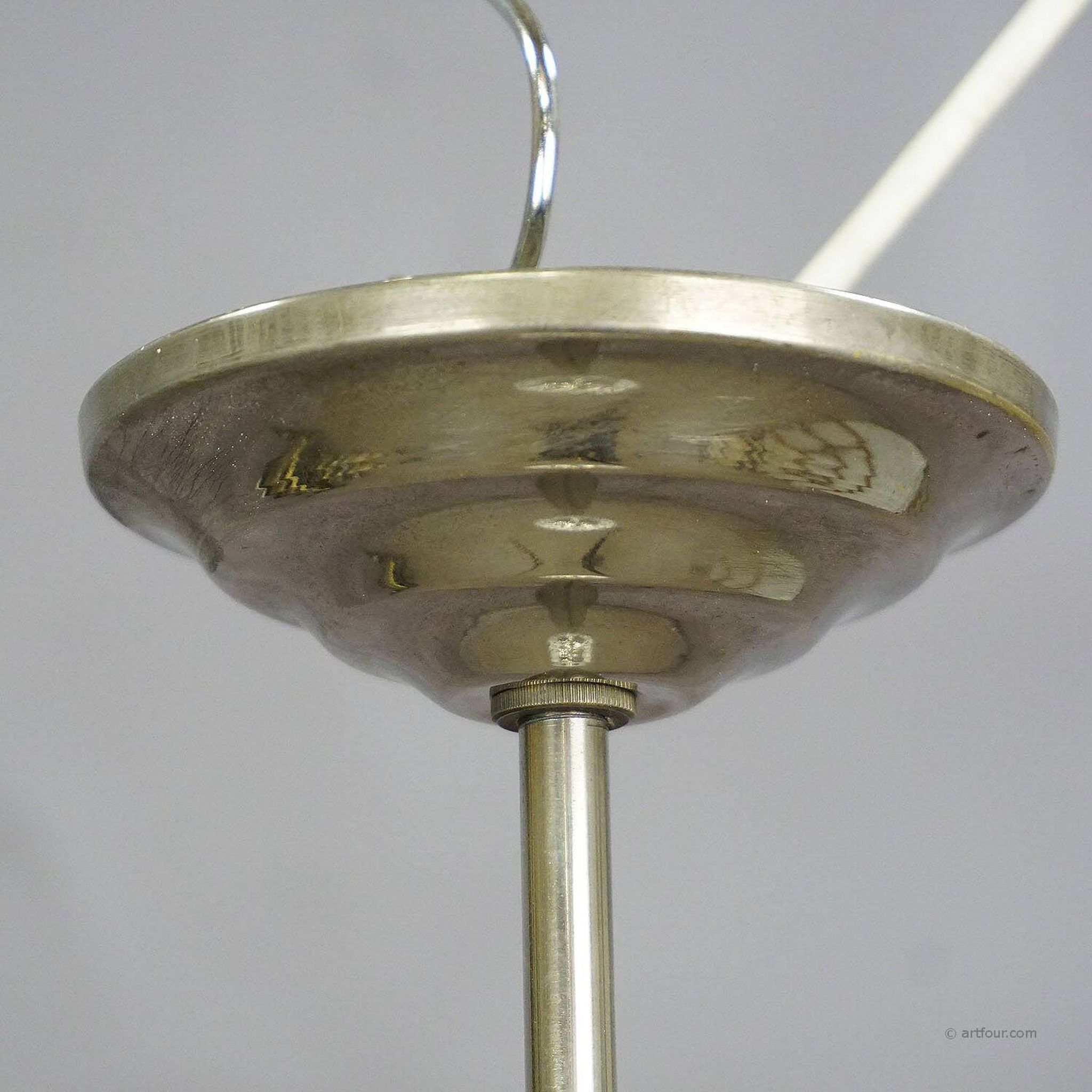 Functional Bauhaus-style pendant light with opaline glass shade.