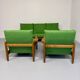 Living room sofa and Scandinavian design armchairs from the 1960s in green boucle.