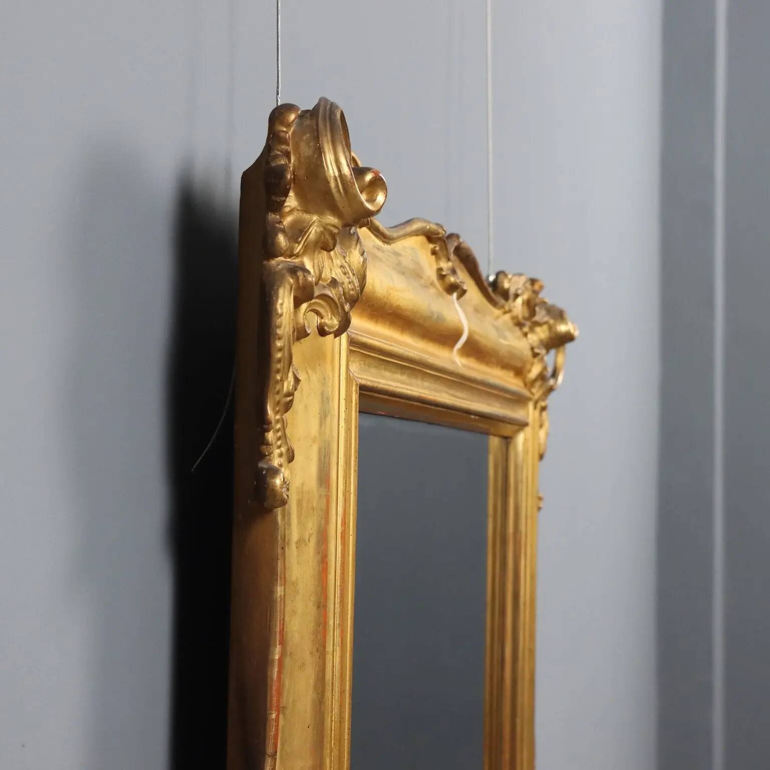Antique carved and gilded wooden mirror, Italy, late 19th century.