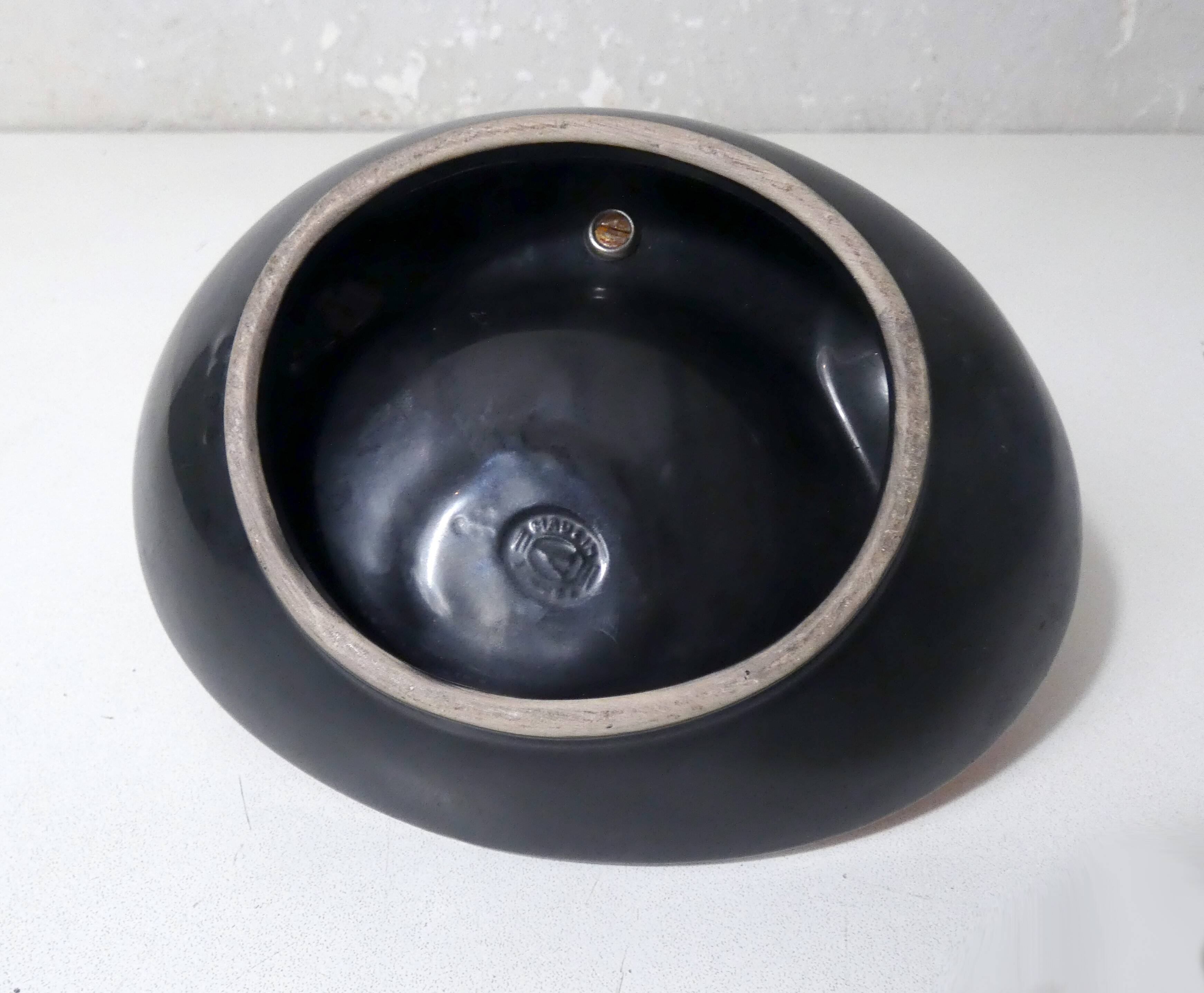 old ceramic and asymmetrical wood pipe ashtray