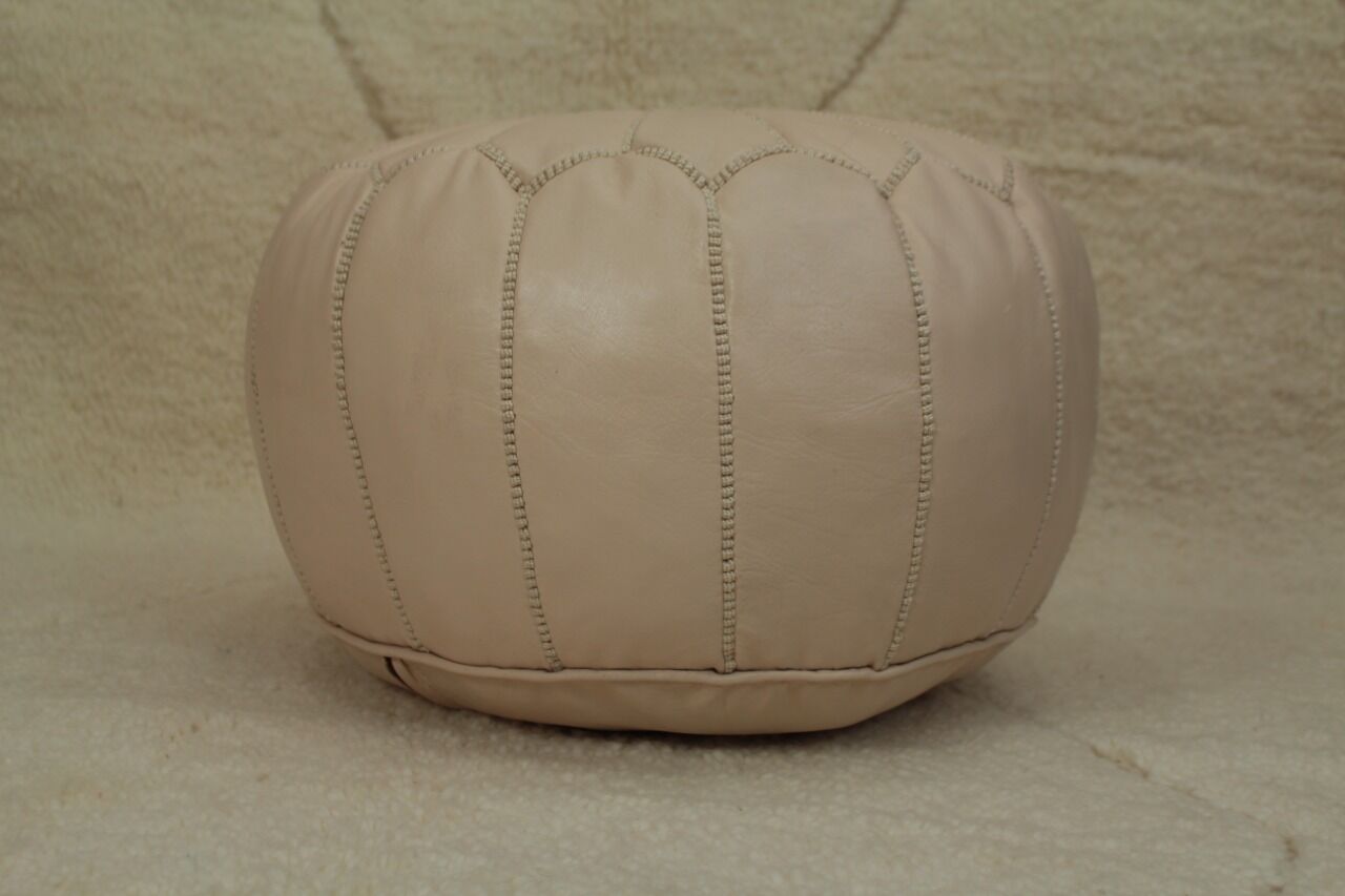 Moroccan pouf in beige leather