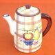 Ceramic coffee maker with fruit decoration